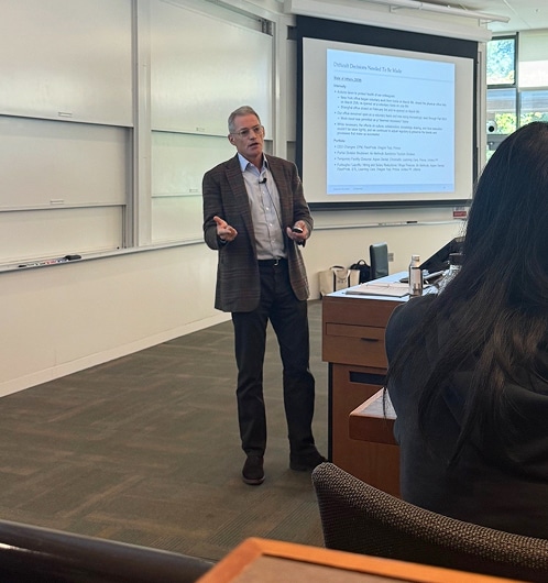 Michael Fisch delivering a guest lecture at Stanford University on leadership and investment strategy