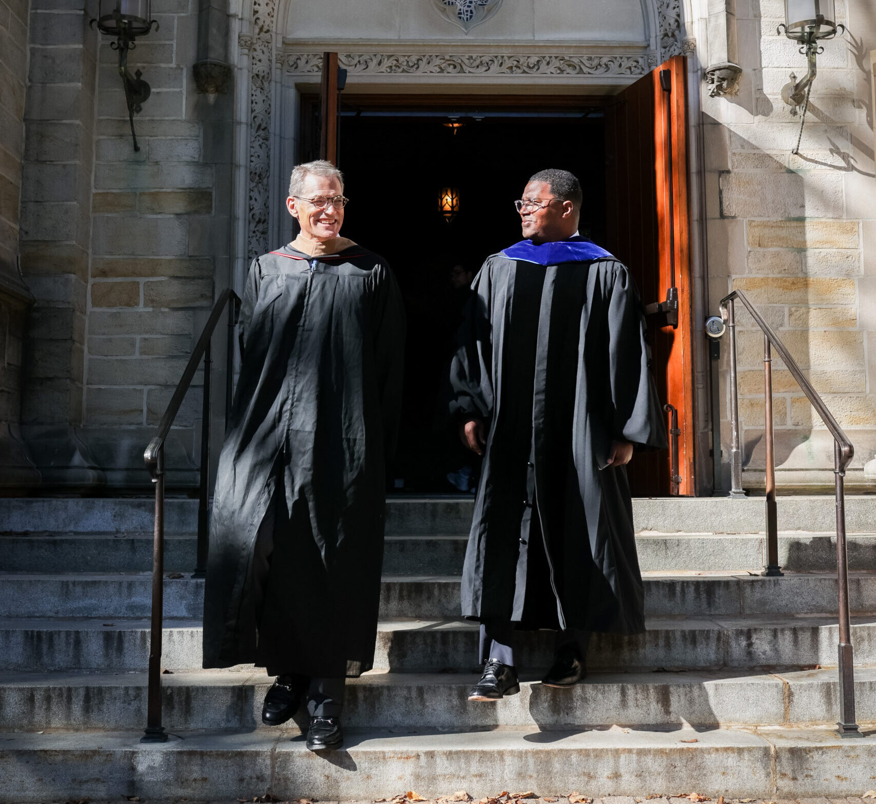 Michael Fisch and Princeton Theological Seminary President Jonathan Lee Walton outside the Seminary.